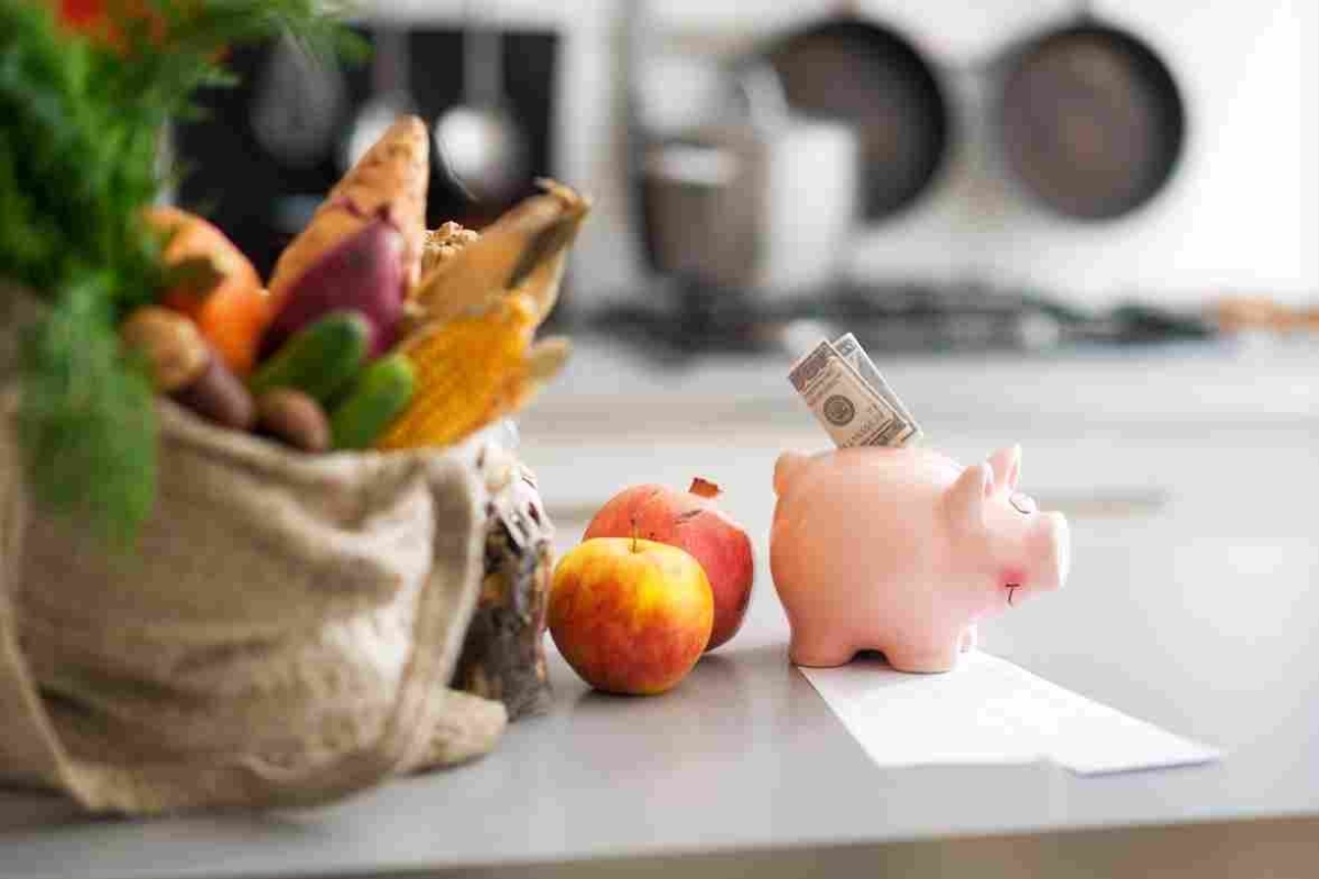 image showing a pink piggy bank on a kitchen countertop