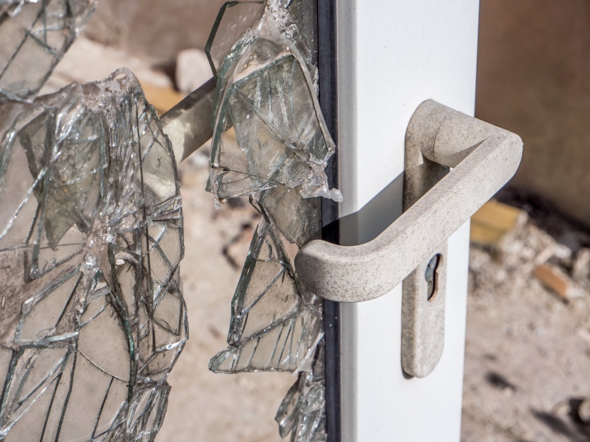 image showing a broken door after a burglary