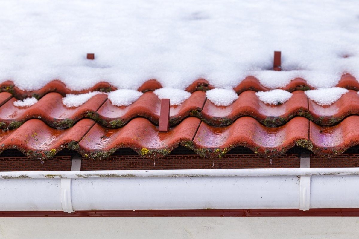 image showing a gutter full of snow