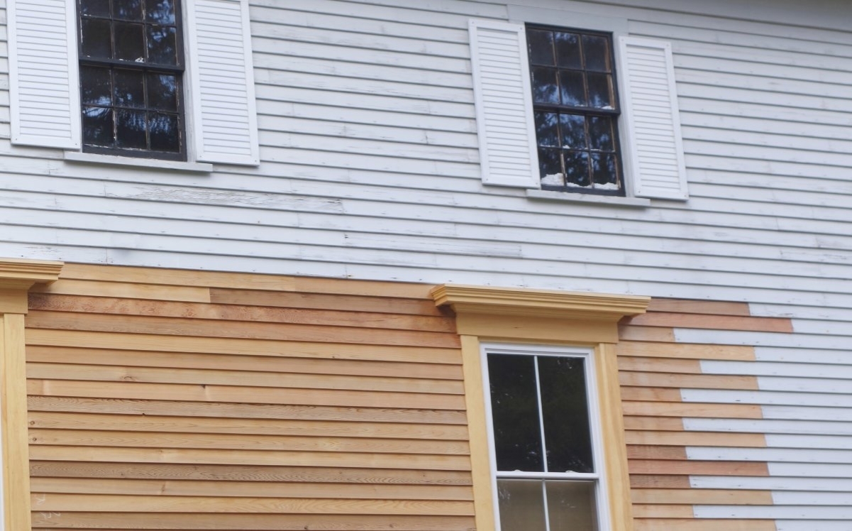 image showing siding replacement process in the make