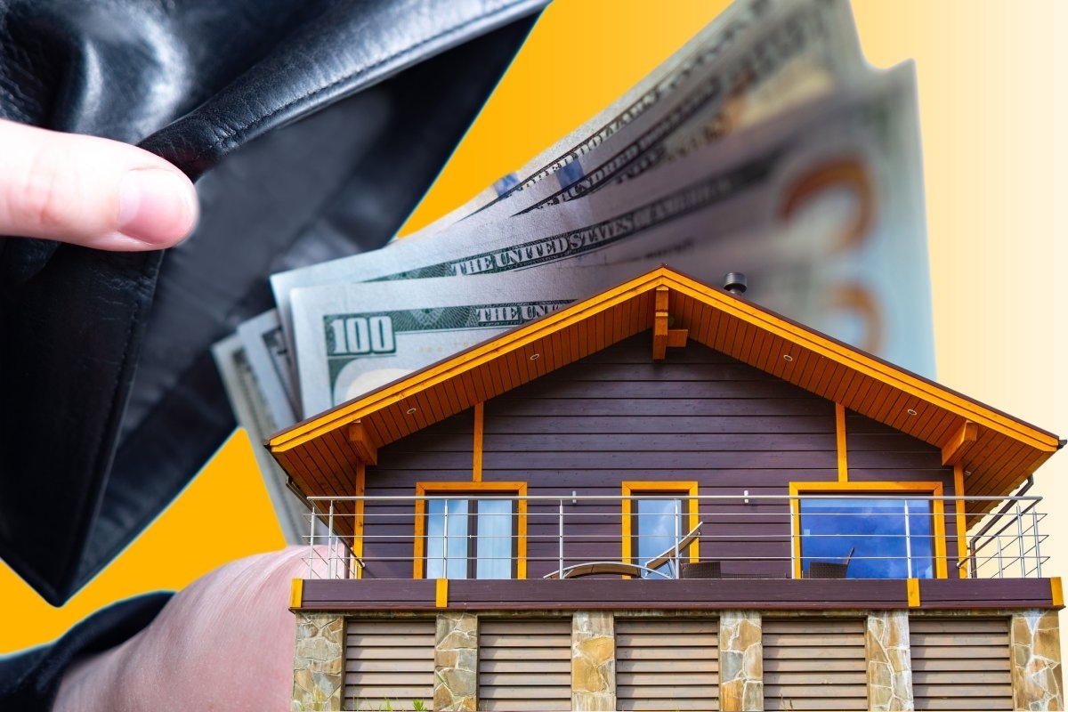 image showing small house with cash money on top of it