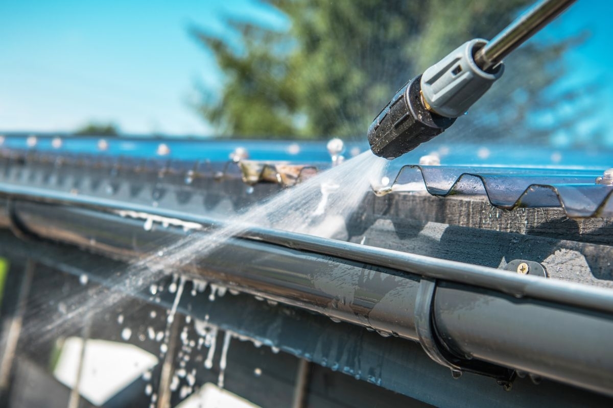 gutter guards being cleaned with pressurized water