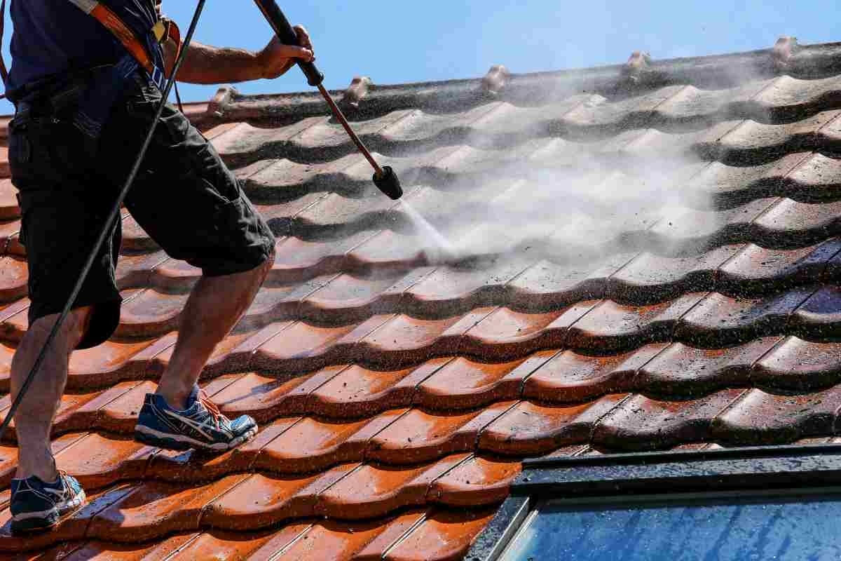 image showcasing the process of roof cleaning
