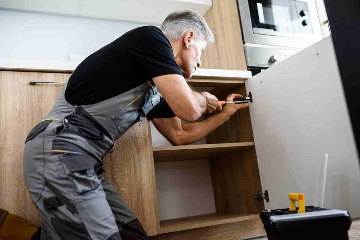 image showing kitchen installer updating cabinets