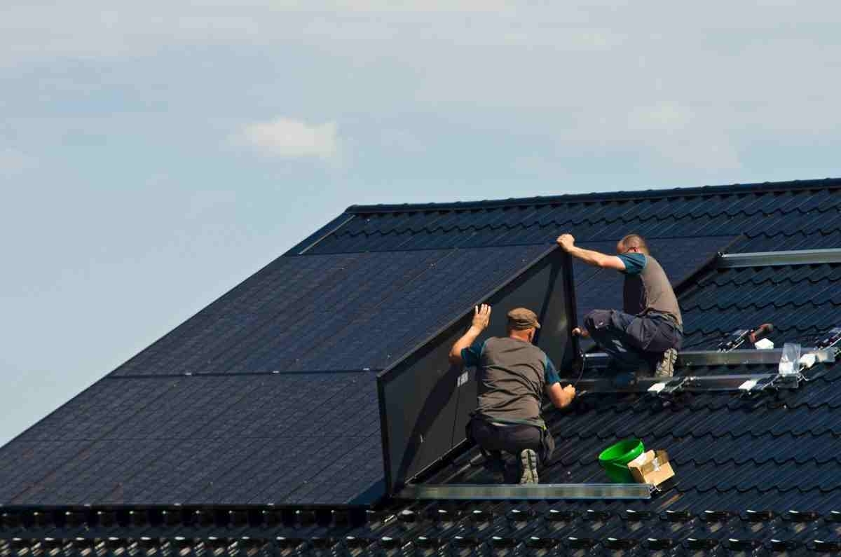 image showing solar panels installed on a metal roof