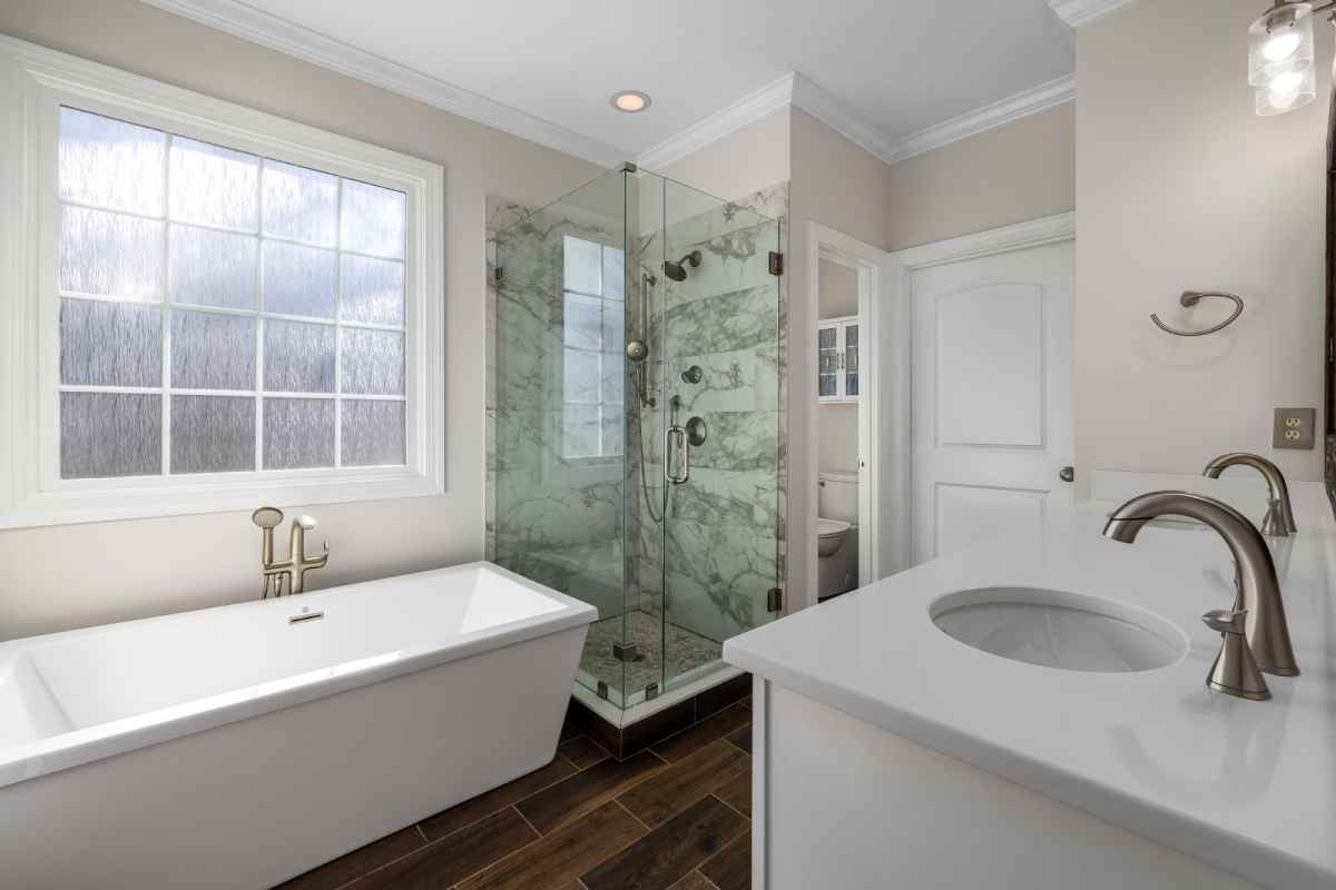 image showing bathroom with both shower and tub