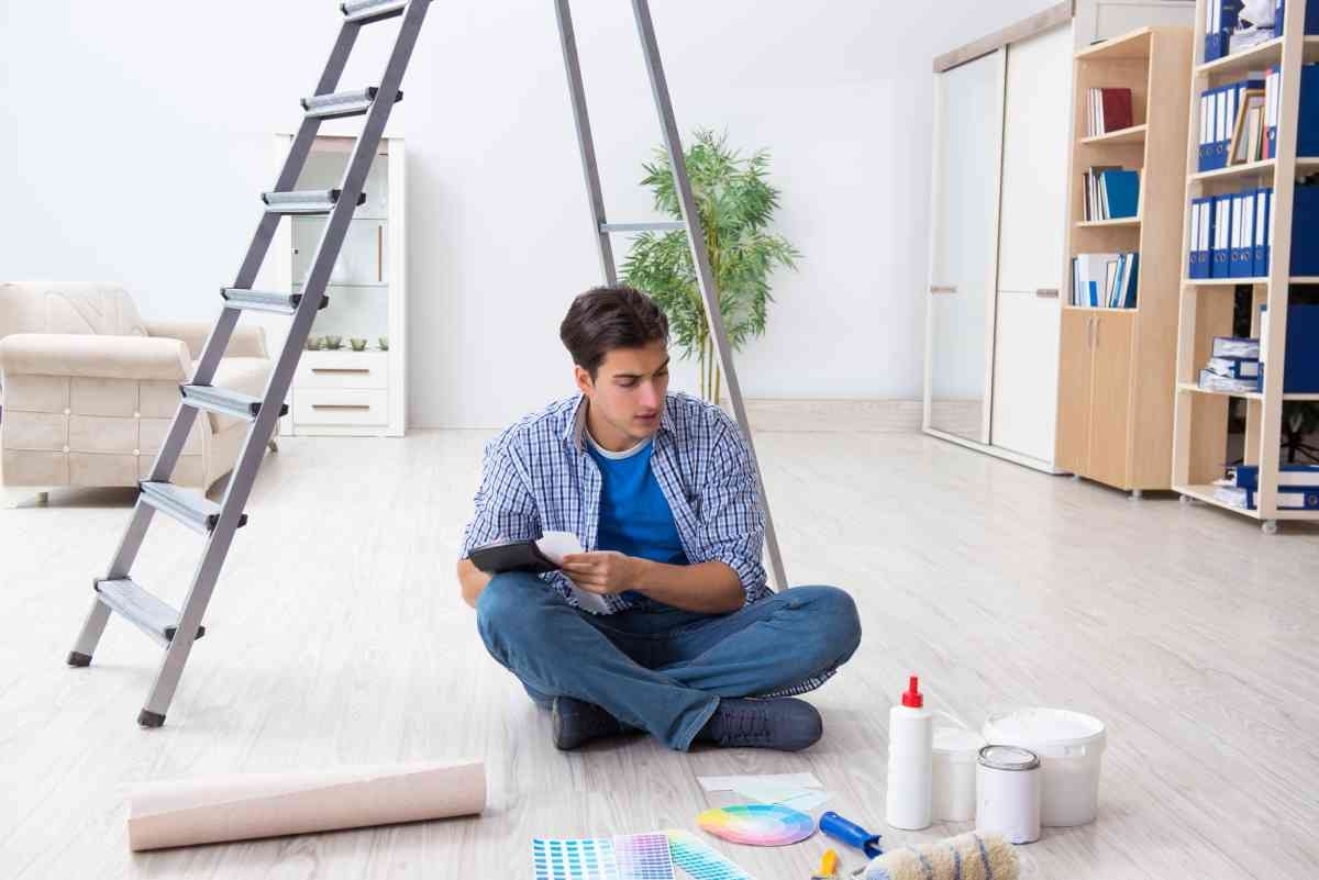 image showing homeowner attempting DIY home improvement projects