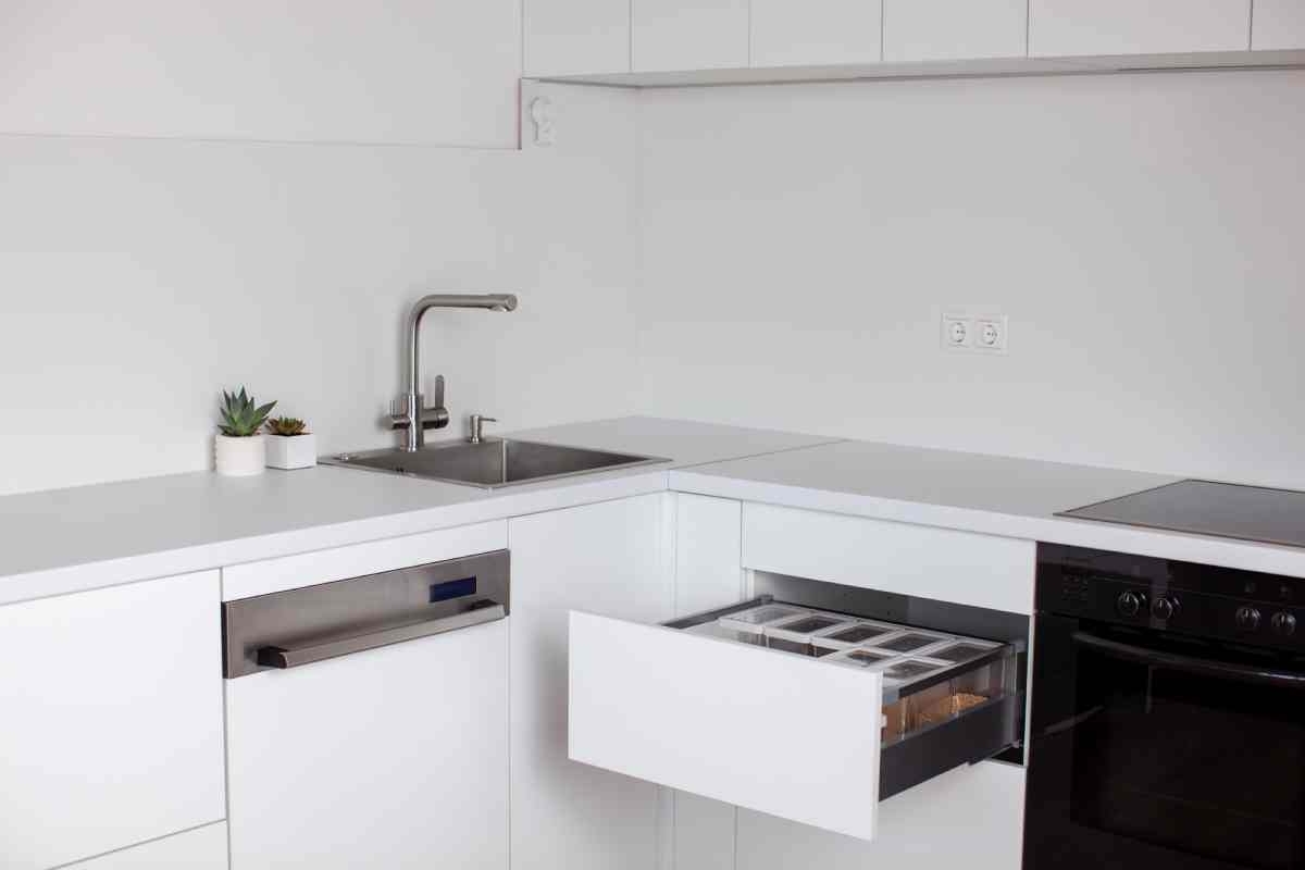 imager showing a kitchen with an open cabinet door