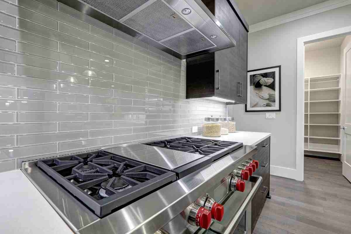 image showing kitchen with grey modern backsplash