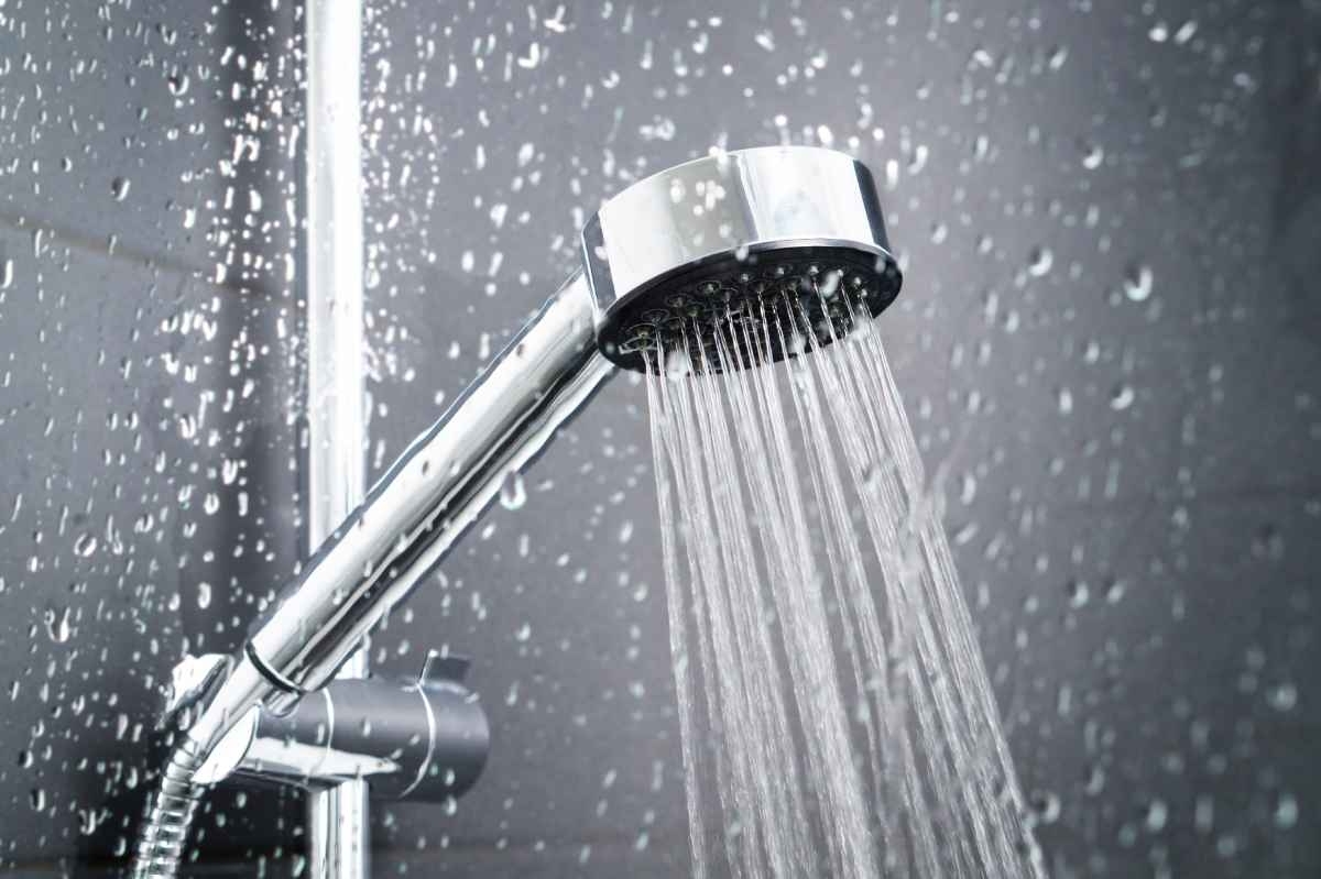 image showing shower head dripping water
