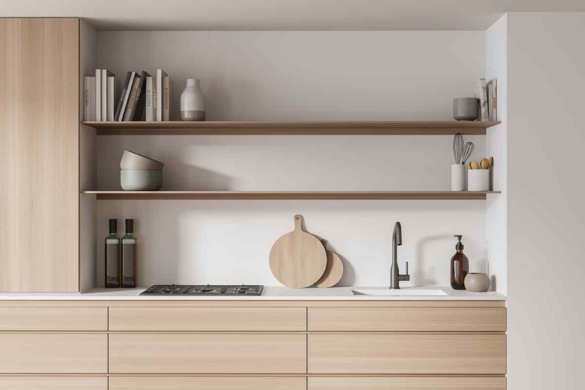image showing a minimalist open kitchen shelving