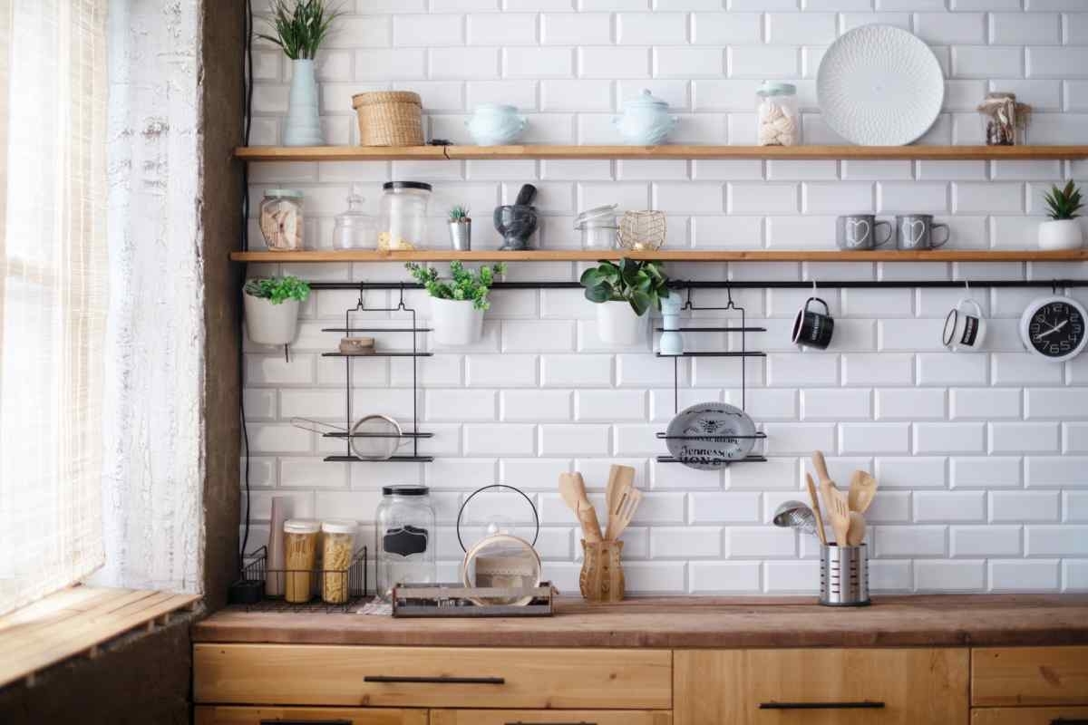 image showing a modern looking kitchen with open pantries