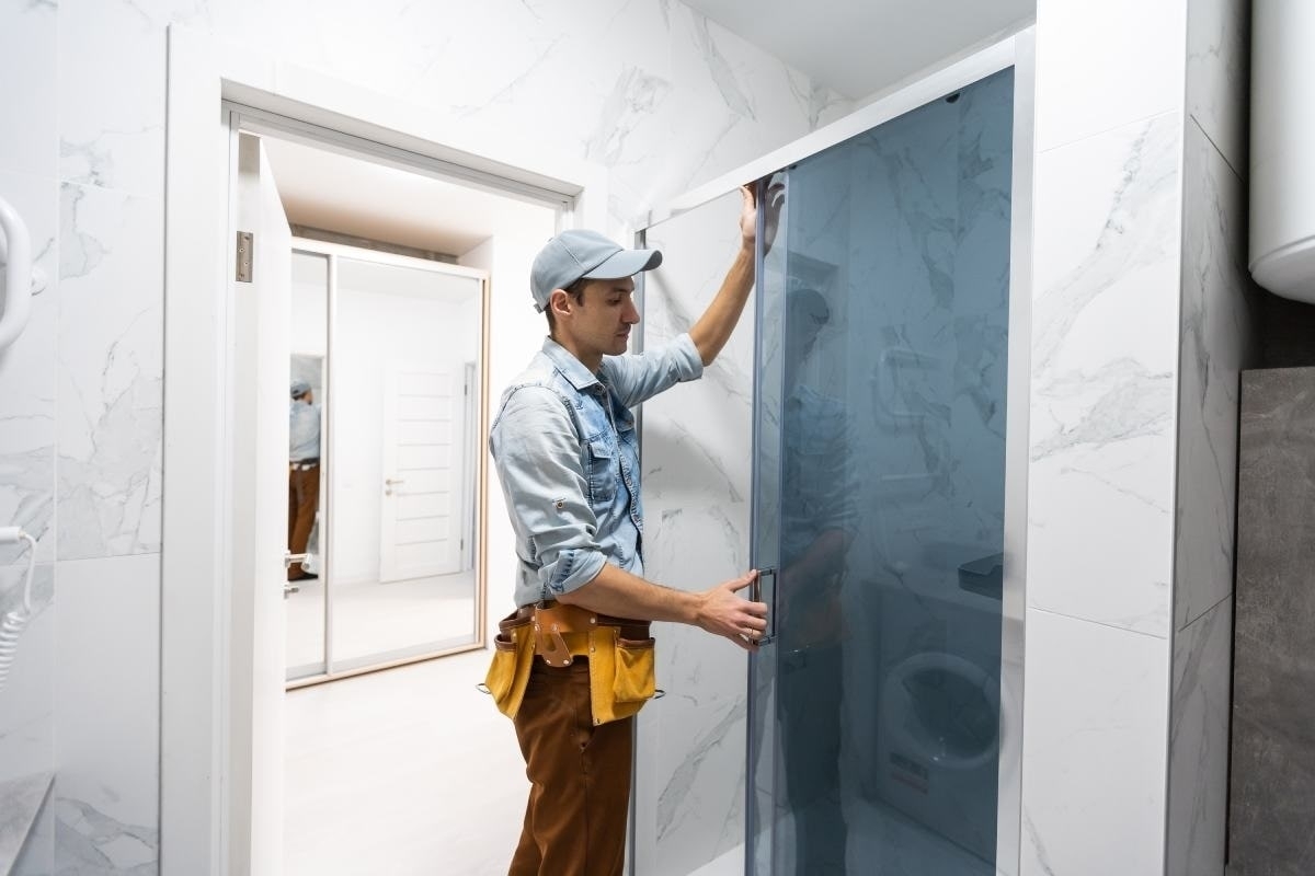 image showing a bathroom pro remodeling a shower