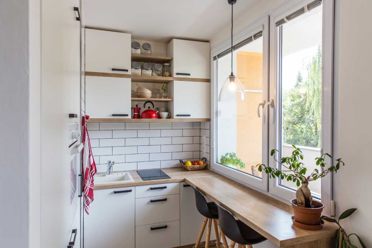 image showing small kitchen with dining table combo