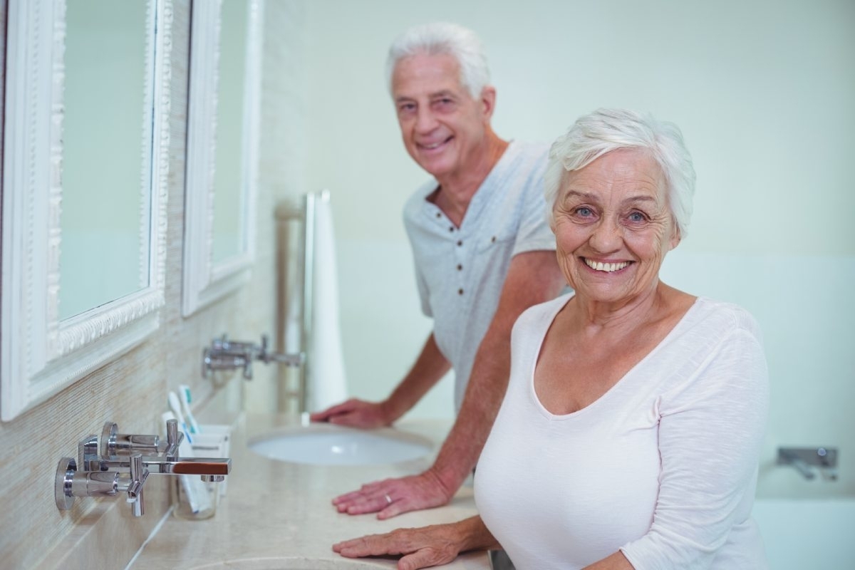 image showing two elderly people in a bathroom