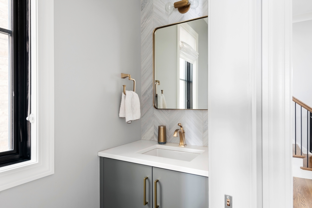 vanity mirror with brass faucet and mirror