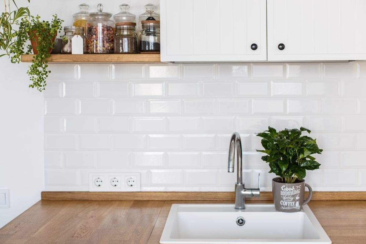 image showing homeowner cleaning their cabinets