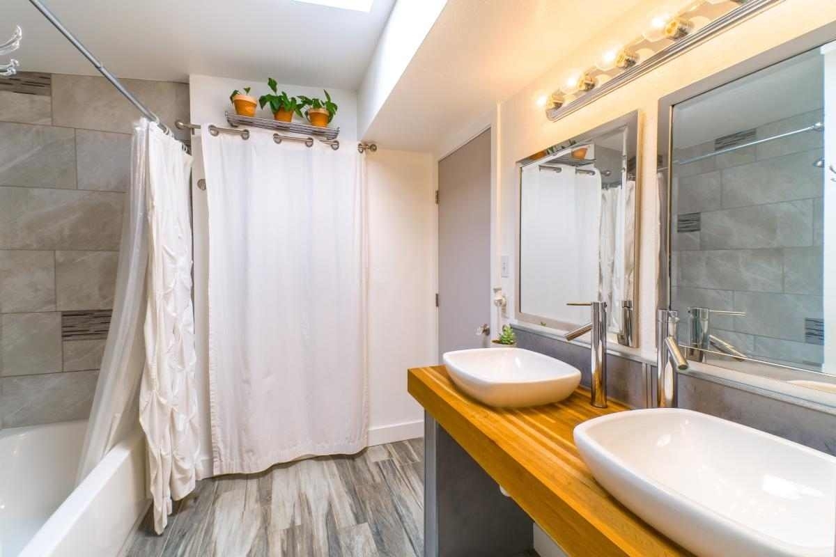 image showing a bathroom with wood details