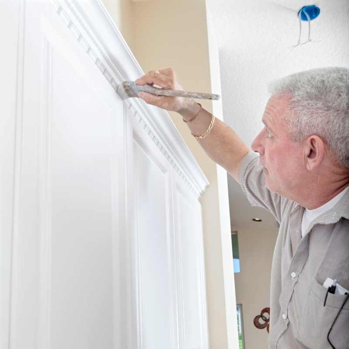 image showing a cabinet door being painted anew