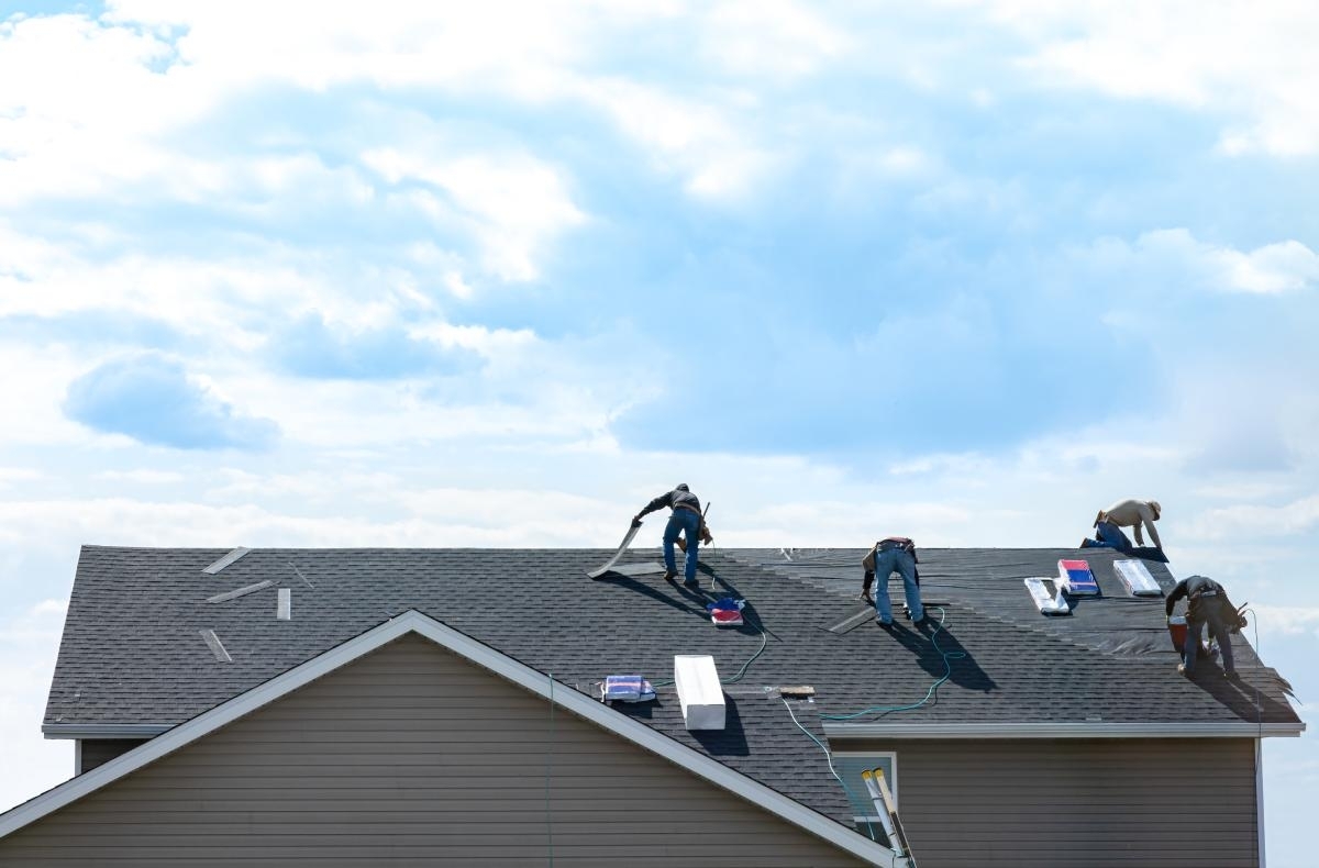 cheap roofers repairing a roof