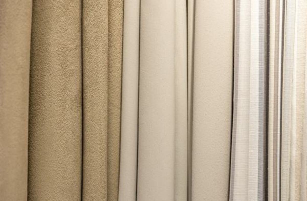 Beige fabric samples for curtains showcase, displayed side-by-side.