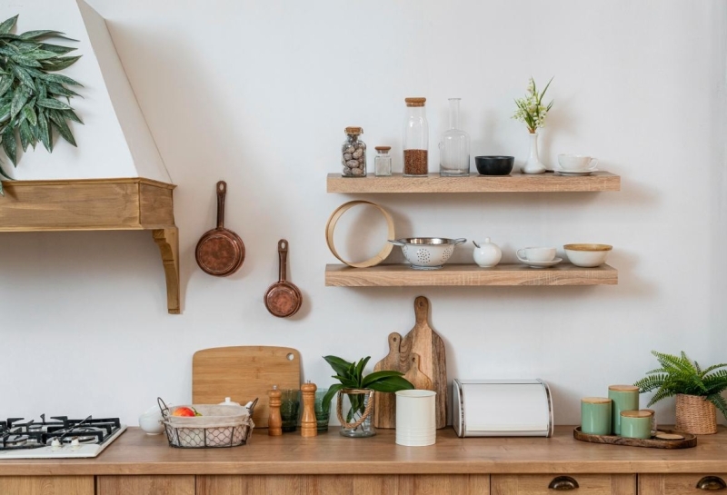 Close-up of a wooden kitchen cabinet showcasing wood materials and kitchen accessories.