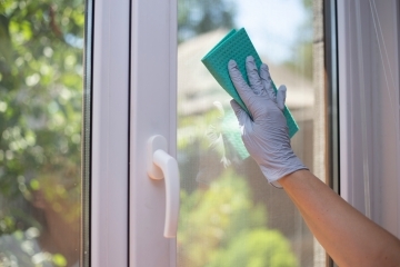 image showing cleaning double pane windows